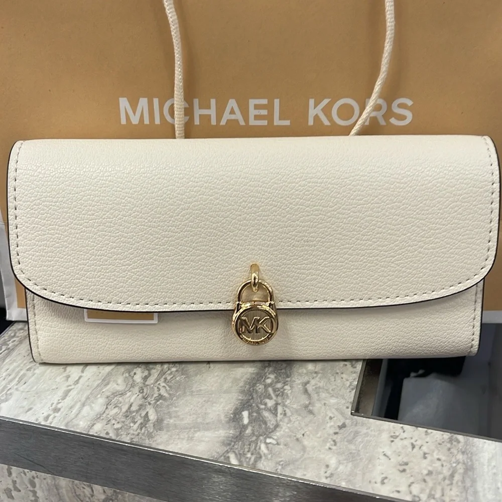 Michael Kors Hamilton Large Leather Continental Wallet
Light Cream
NWT
L - Picture 12 of 16